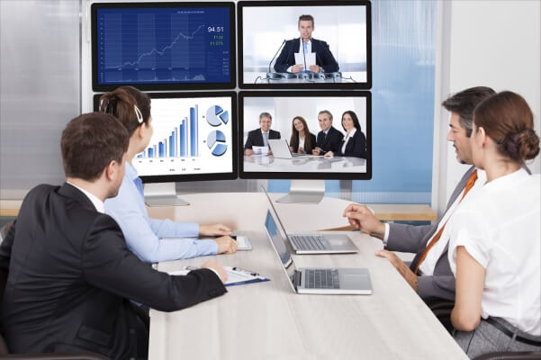 Picture of a small group sales coaching session in virtual classroom setting.