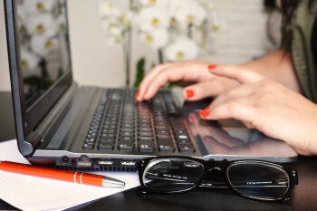 A picture of a person completing an assessment to support a page about bespoke assessments.