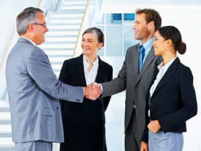 A picture of business people to support a page about customer referrals and setting up a customer referral program.